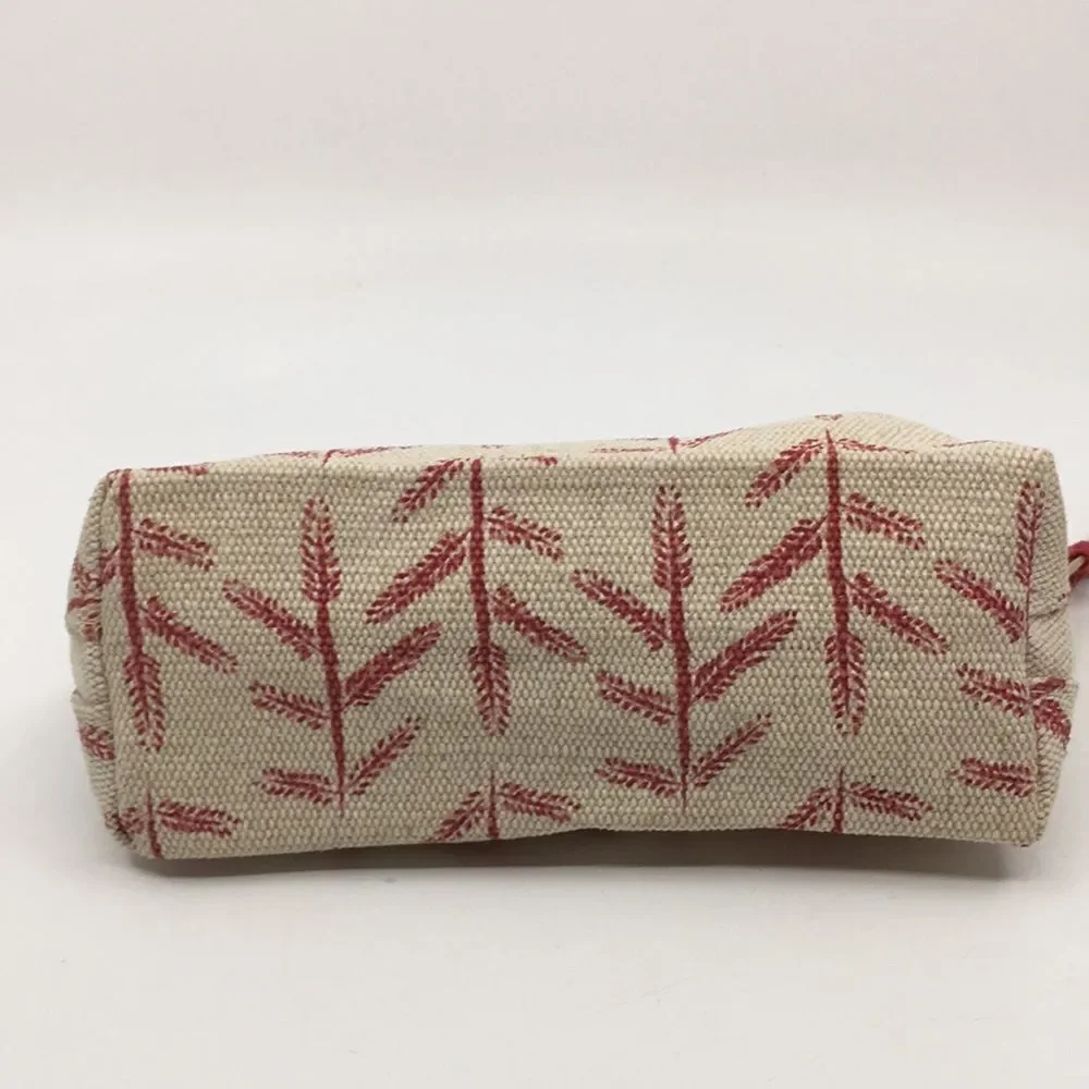 FEED 10 Clarins makeup cosmetics light tan and red carry-all pouch
